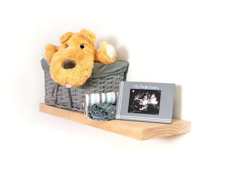 Raw Pine floating shelf with nursery items on top
