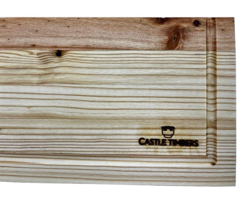Eucalyptus chopping board with Castle Timbers logo