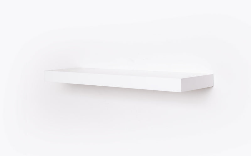 A standard white econo floating shelf 