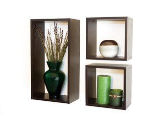 Vase and candles on black MDF combination cubes